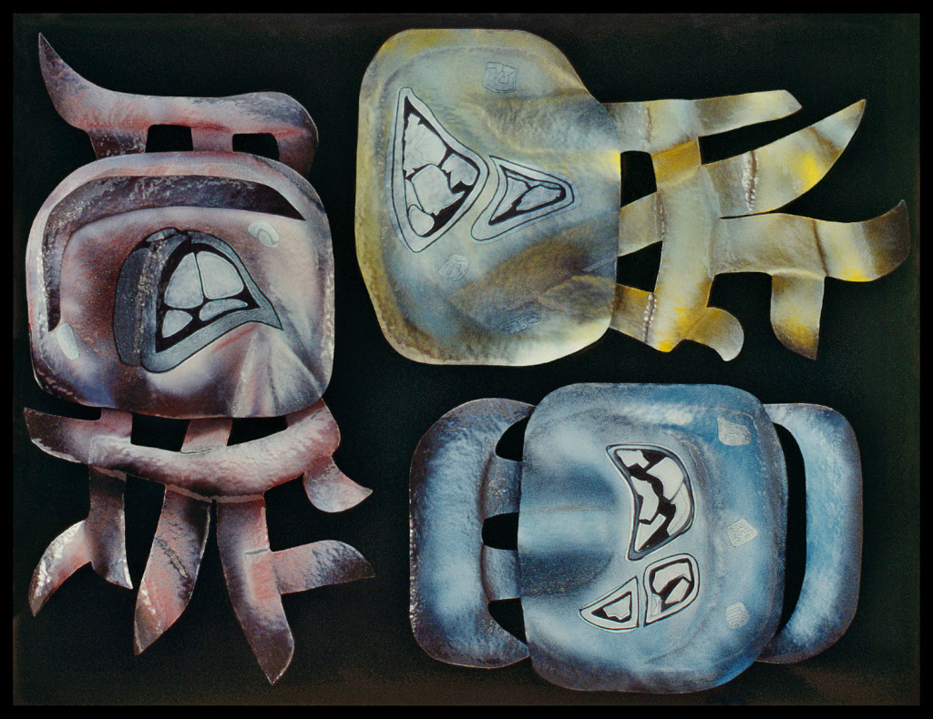 An artwork with a black, metal background that emphasizes three jellyfish-like shapes. The shape on the left is red with a watery hammered texture. It is a circle with four branches connected to the bottom of it and a cell-like form in the center of the circle. It also has three, short, connected branches coming from the top of the circle. A similar shape is placed horizontally next to it on the right. This yellow shape has the same circle with two cell-like form inside of it. Its branches are coming from the right side of the shape. Underneath the yellow form is a blue one with three cell-like forms in the center circle. The circle is surrounded by connected branches that encase it.
