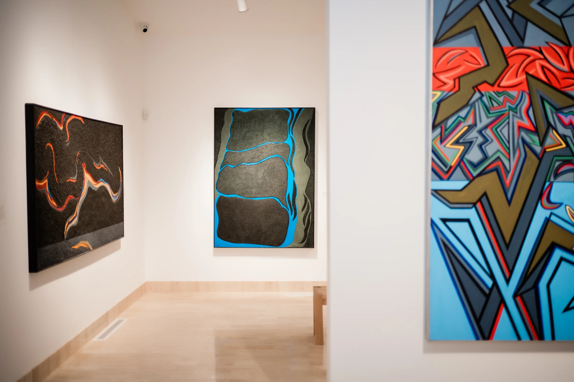 The entrance to the texture series room. The Rita Deanin Abbey work, 'Magma' can be seen on the left, and 'Exultation' in the center. Off to the right side is a work in another series called 'Origins of being'